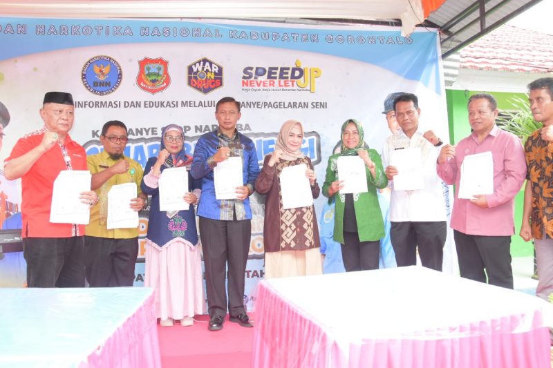 Kampanye Stop Narkoba dan Penandatanganan Perjanjian Kerja Sama (PKS), PKK, dengan kepala desa buhu,pihak sekolah, LSM, Organisasi pemuda dan masyarakat. (foto:dok)